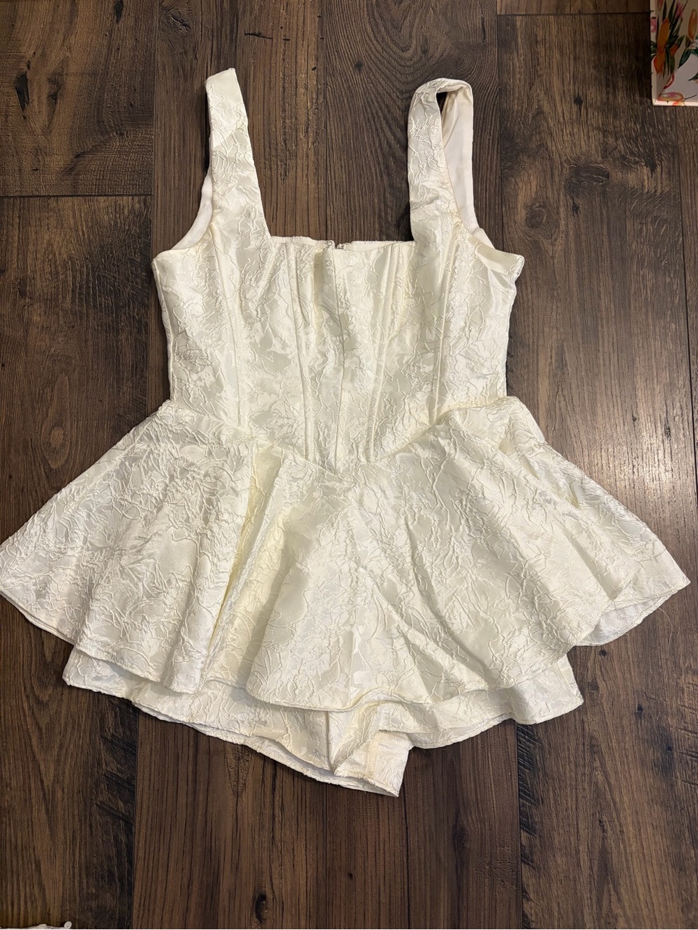 Ivory Textured Peplum Romper
